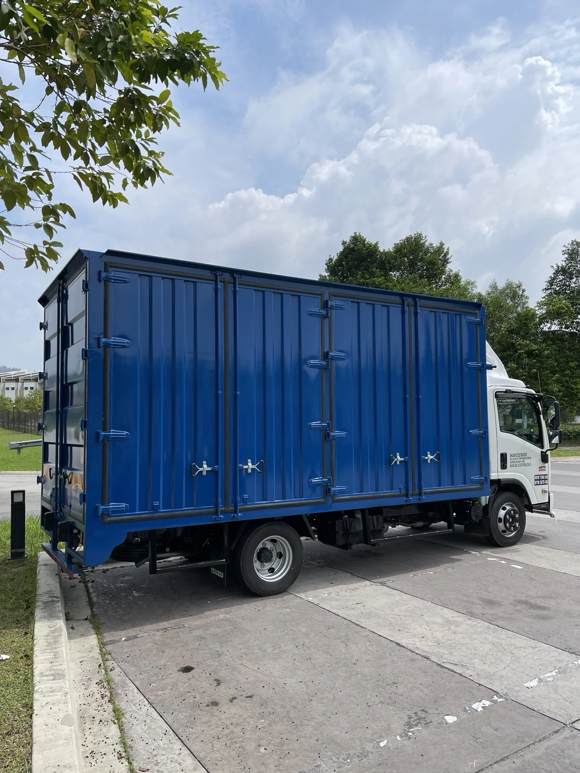 Isuzu lorry with a corrugated box body