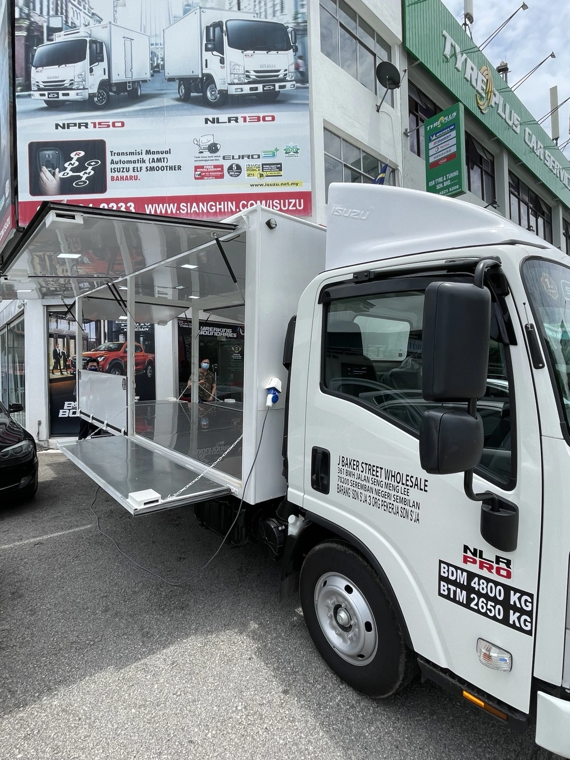 Isuzu lorry with a custom mobile display body
